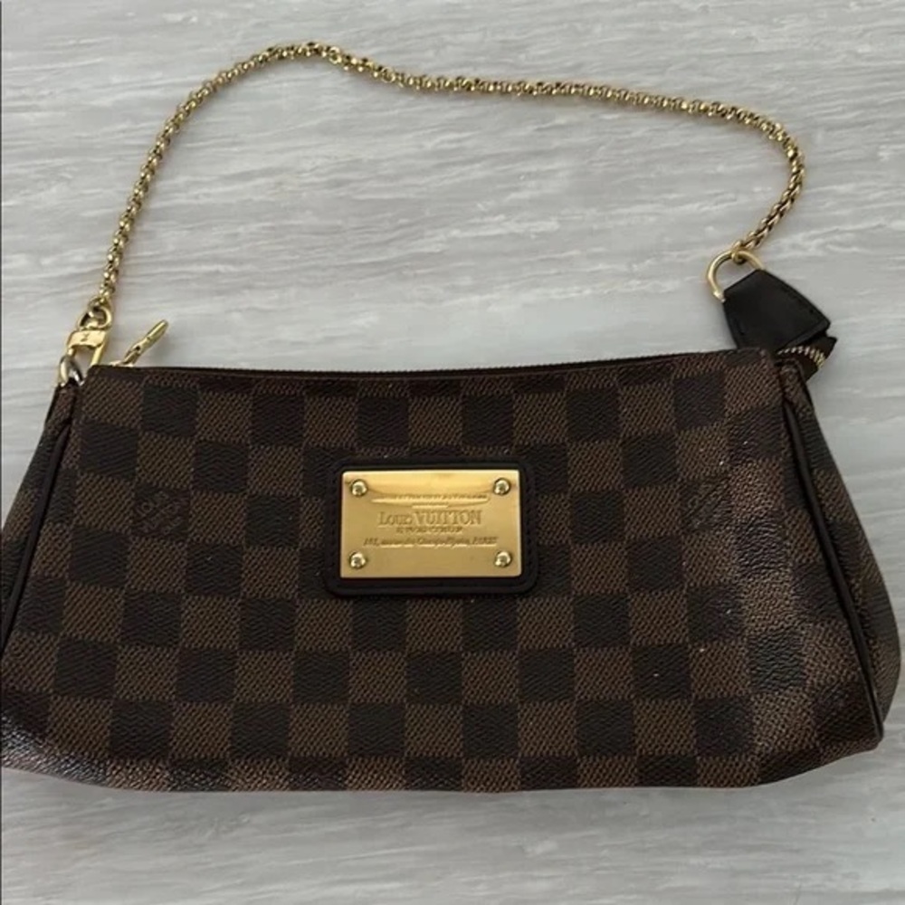 Louis Vuitton Brown Clutch with Gold Accents